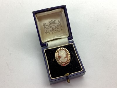 Lot 55 - A Cameo Style Dress Ring, oval shell carved...