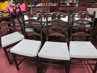 Lot 1621 - Dark Ercol Dining Table and Chairs, with a...