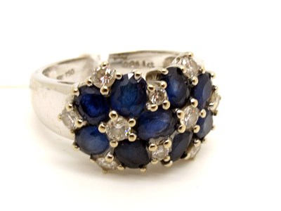 Lot 118 - A Modern Sapphire and Diamond Set Dress Ring,...