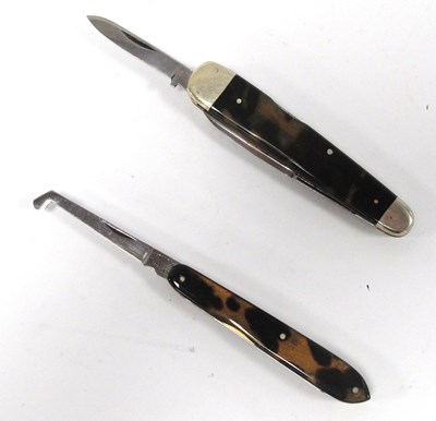Lot 1352 - Two Multi Tool Folding Pocket Knives, tortoise...