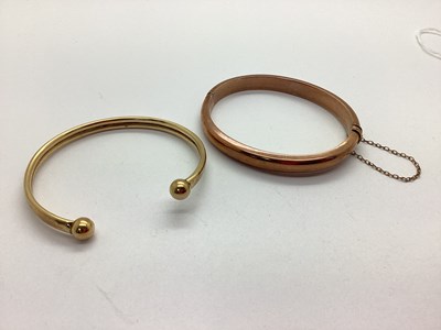 Lot 73 - A 9ct Gold Hollow Torque Style Bangle,...