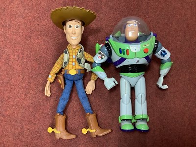 Lot 878 - Two Original Toy Story Plastic Action Figures...