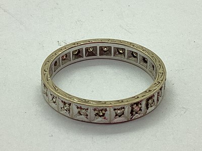 Lot 45 - A Diamond Set Eternity Band, illusion set...