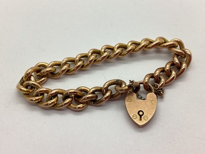 Lot 69 - A Curb Link Bracelet, rose colour, links...