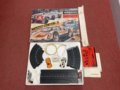 Lot 706 - A Marklin Sprint #1409 Slot Car set. Contents...