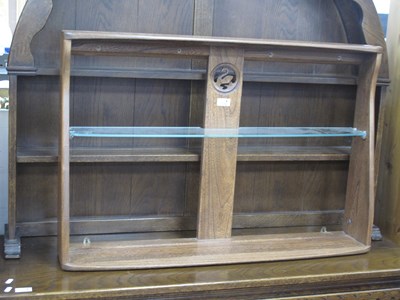 Lot 1572 - Ercol Wall Rack, with a swan to central...