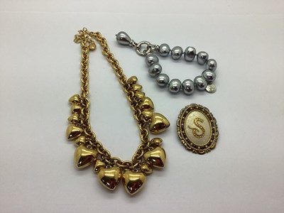 Lot 144 - A Chunky Puffed Heart Gilt Coloured Necklace,...