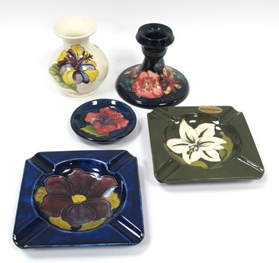 Lot 1121 - A Moorcroft Pottery Candlestick, painted in...