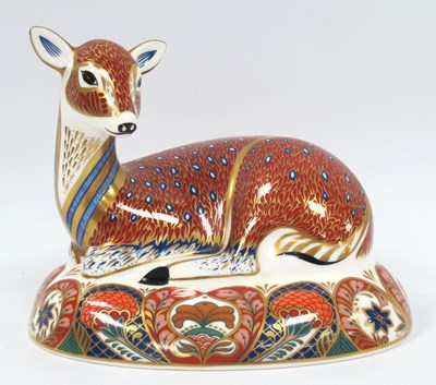 Lot 1174 - A Royal Crown Derby Porcelain Paperweight...