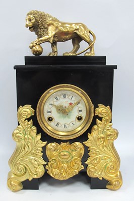 Lot 1548 - A French Mantle Clock, the black slate case...