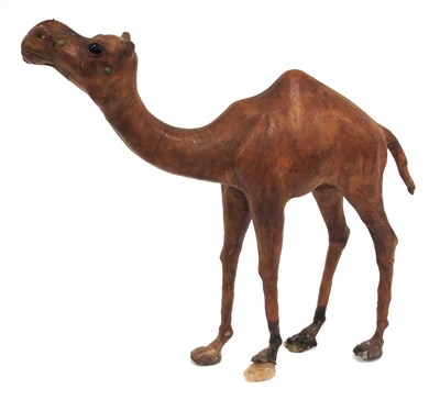 Lot 1374 - A leather model of a camel with glass eyes, in...