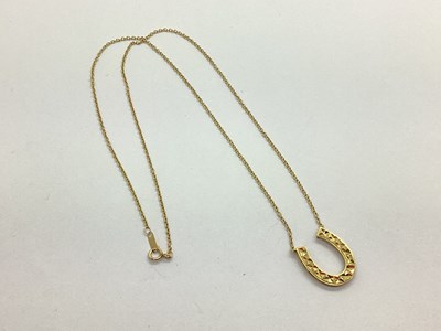 Lot 39 - A Modern "OC 14K" Horseshoe Necklace, to...