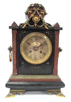 Lot 1485 - A heavy black slate and red marble coloured...