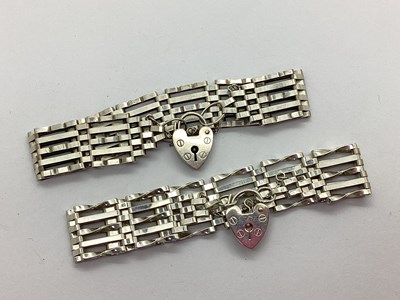 Lot 117 - Two Gate Link Style Wide Bracelets, (stamped...