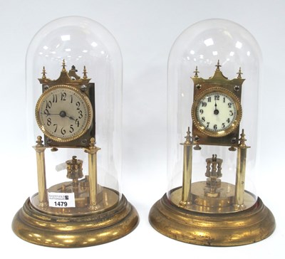 Lot 1479 - A German brass mantle clock under glass dome...