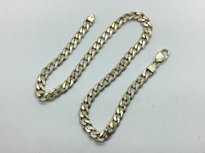 Lot 127 - A Hallmarked Silver Flat Curb Link Chain,...