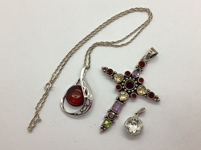 Lot 136 - A Large Multi Set Cross Pendant, collet set...