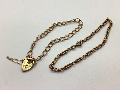 Lot 65 - A Curb Link Bracelet, to 9ct gold heart...