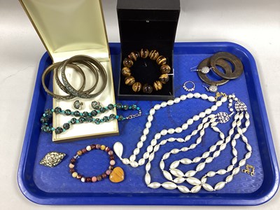 Lot 228 - Modern Polished Tiger's Eye Bead Bracelet,...