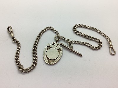 Lot 257 - A Graduated Curb Link Albert Chain, to swivel...