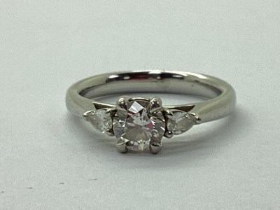 Lot 165 - A Modern 950 Platinum Three Stone Diamond Ring,...
