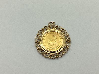 Lot 45 - A 1/10 Kruggerand 1982, loose mounted, within...