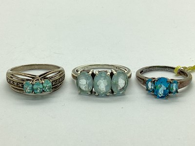 Lot 93 - An Oval Three Stone Ring, of uniform design,...