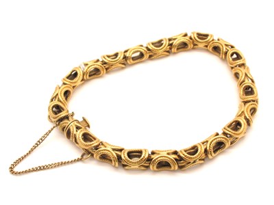 Lot 101 - A Fancy Link Bracelet, of openwork design, to...