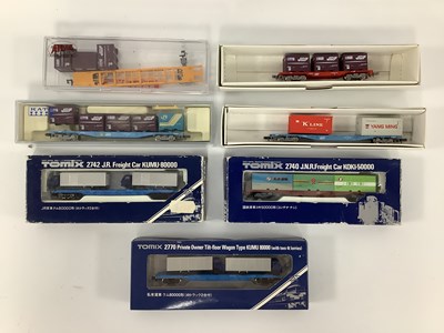 Lot 775 - Seven boxed N gauge bogie flat wagons by Tomix,...