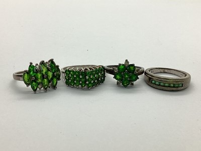 Lot 95 - A Three Row Cluster Ring, of tiered design,...