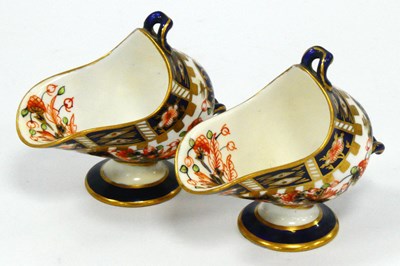 Lot 1077 - A Pair of Royal Crown Derby Miniature Coal...