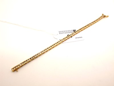 Lot 97 - A Modern Diamond Set Line Bracelet, channel...