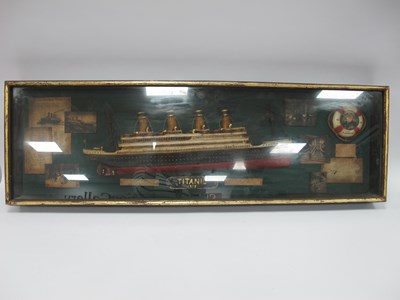 Lot 1412 - Wall Hanging, a cased model of the Titanic,...