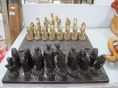 Lot 1480 - A wooden chess board complete with all chess...