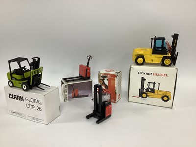 Lot 730 - Four Diecast Model Fork Lift and Pallet Trucks...