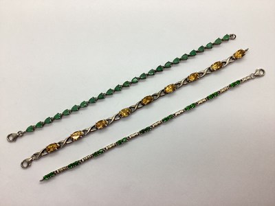 Lot 122 - A Modern Emerald Line Bracelet, uniform...