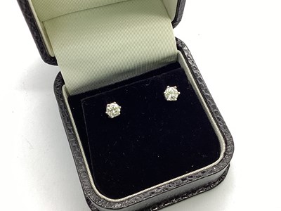 Lot 71 - A Pair of Single Stone Diamond Earstuds, each...