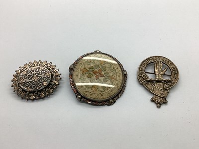 Lot 135 - An Arts & Crafts Style Circular Panel Brooch,...