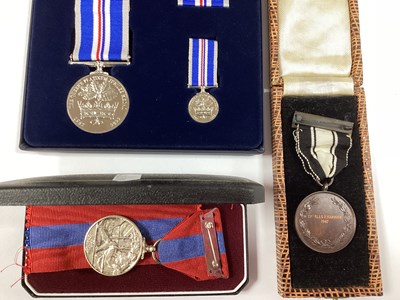 Lot 851 - Three Boxed Medals, comprising Queen's...
