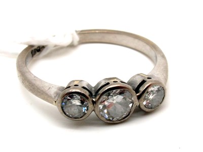 Lot 124 - A Modern Three Stone Diamond Ring, the...