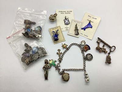 Lot 132 - A Dainty Curb Link Charm Bracelet, suspending...