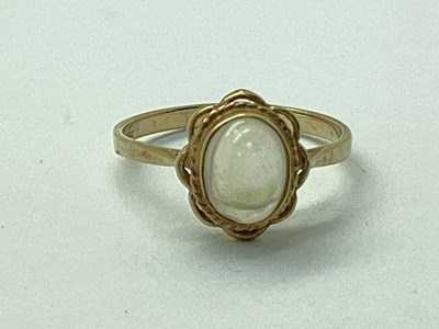 Lot 36 - A Moonstone Single Stone Dress Ring, oval...