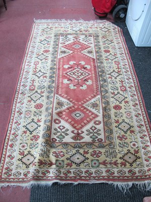 Lot 1605 - Middle Eastern Rug, with a central red ground...