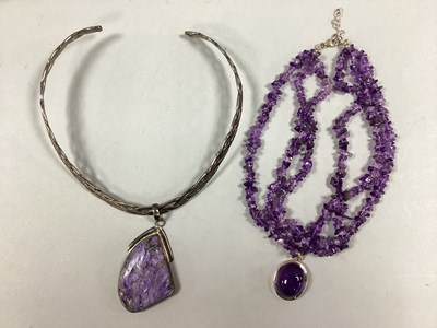 Lot 121 - A Tumbled Amethyst Three Row Short Necklace,...