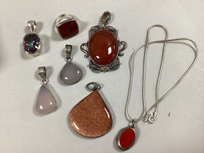 Lot 143 - Polished Hardstone and Other Pendants,...