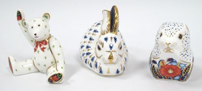 Lot 1177 - Three Royal Crown Derby Porcelain Paperweights,...