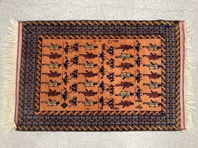 Lot 1475 - An Unusual 1980's Afghan Rug, the orange...