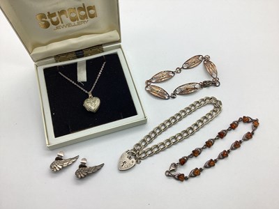 Lot 105 - A Hallmarked Silver Heart Shape Locket Pendant,...