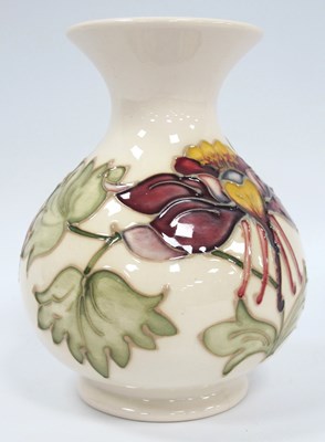 Lot 1153 - A Moorcroft Pottery Vase, of baluster form...
