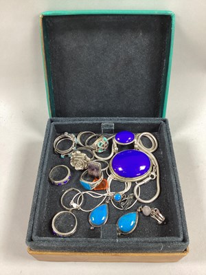 Lot 106 - A Large Modern Two Stone Pendant, on smooth...